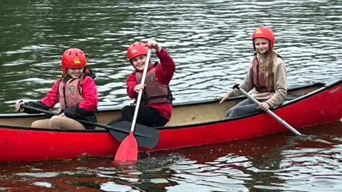 RAF Benevolent Fund Three girls in a canoe