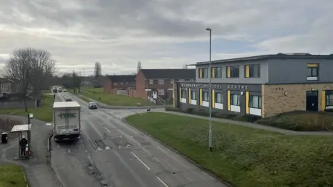 Ben Schofield/BBC A view over Queensway medical centre in Wellingborough