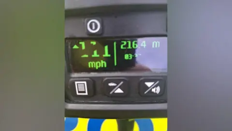 Image of speed recording on a speed gun revealing 111mph.