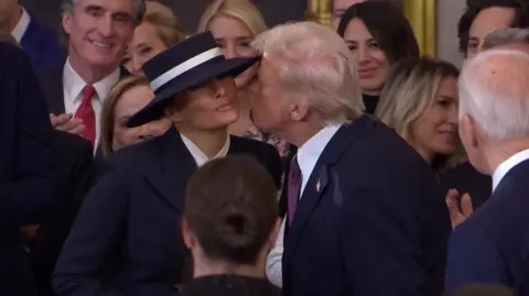 Donald Trump tries to buss  Melania