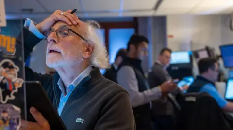 Getty Images Traders on the floor of the New York Stock Exchange.