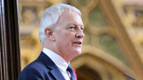 A headshot of New Zealand's High Commissioner to the United Kingdom Phil Goff speaking at a commemoration service in Westminster Abbey