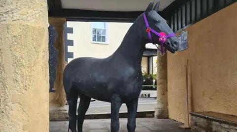 Nicky Brown A black model horse in Faringdon.
