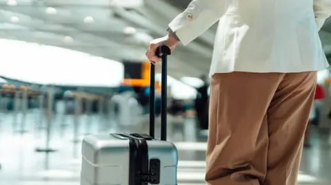 Getty Images Stock photo of luggage in airport departures