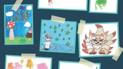 Jersey Post A number of hand drawn pictures by children taped to a wall, including toadstools and monsters. 