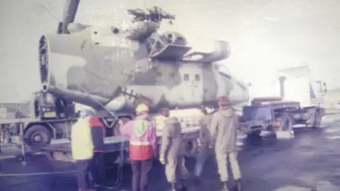 The Helicopter Museum An old photograph of a helicopter being transported by an articulated lorry