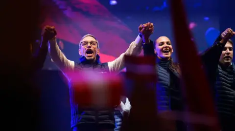 Getty Images Herbert Kigl, front-runner of the far-right Freedom Party of Austria (FPOe), cheers at an FPOe election rally ahead of Austrian parliamentary elections on September 27, 2024 in Vienna, Austria. 