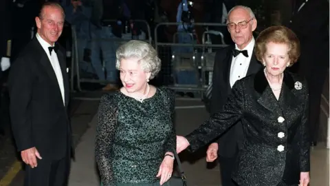 PA Queen Elizabeth and Prince Philip with Margaret Thatcher