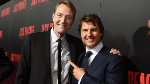 Getty Images Lee Child (left) and Tom Cruise