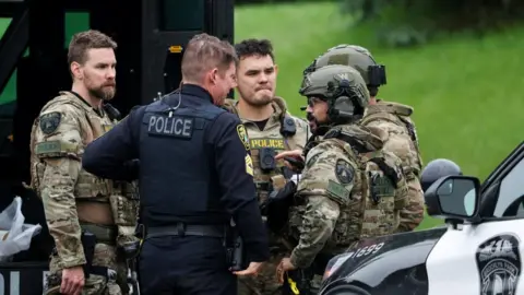 Reuters Police gather in Brooklyn Park, Minnesota