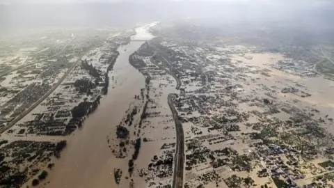 EPA An aerial photo shows the extent of flooding in Japan