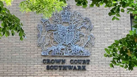 Brian Farmer/BBC A general view of a crown court sign on the side of a building. It reads Crown Court Southwark.