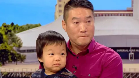 Olli Chu and his dad Ricky
