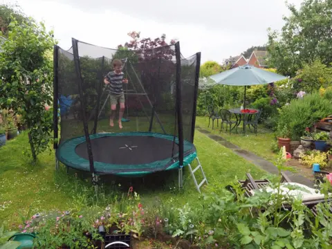 BBC Rowan jumping on the trampoline