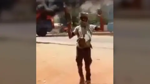 RSF soldier in front of police HQ in Darfur, Sudan