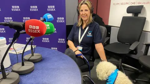 Robyn Wallis/BBC Tina Jullings said the dogs "relieve stress" and "share the joy"