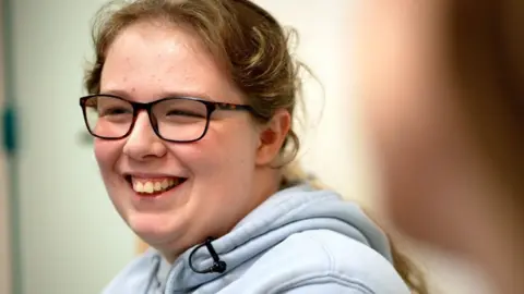 BBC News Lily, 15, is simply a GCSE pupil  astatine  the schoolhouse  who enjoys play  and football