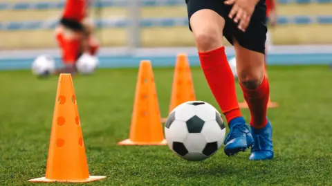 Getty Images Football training child