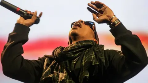 Matt Cardy/Getty Jay-Z performing at Glastonbury in 2008