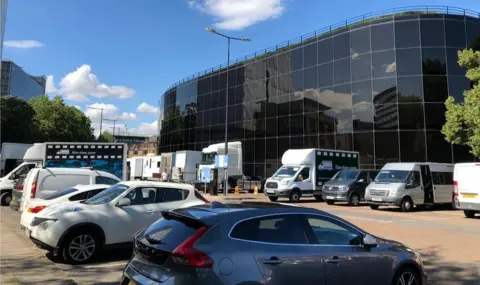 BBC Vehicles belonging to the film production team at Cromwell Square in Ipswich