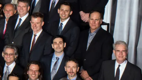 Todd Wawrychuk A group of men in the Oscars class photo