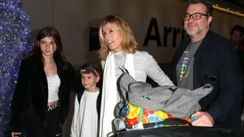 Getty Images Kate Garraway with Derek Draper and their children