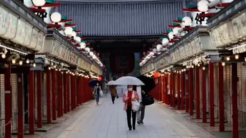 Reuters Closed shops in Asakusa district in Tokyo