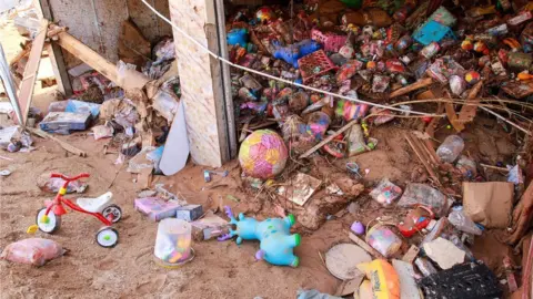 AFP Toys seen in damaged shop