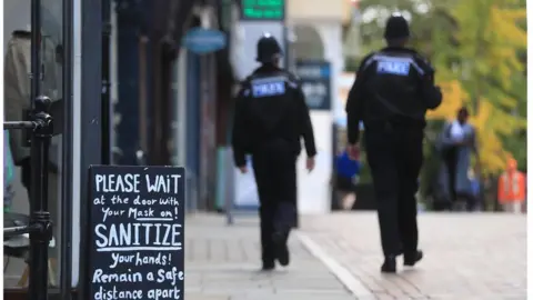 PA Media Police officers in Nottingham