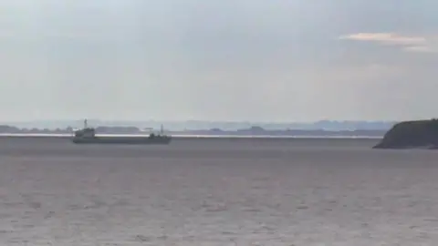 BBC A dredger involved in the mud dumping operation off Cardiff Bay