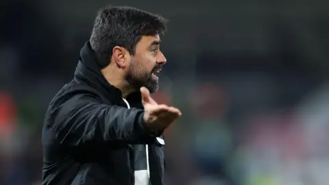 Vitor Matos gives instructions on the touchline 