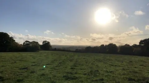 RNA Energy The sun shines over Pent Farm in Postling