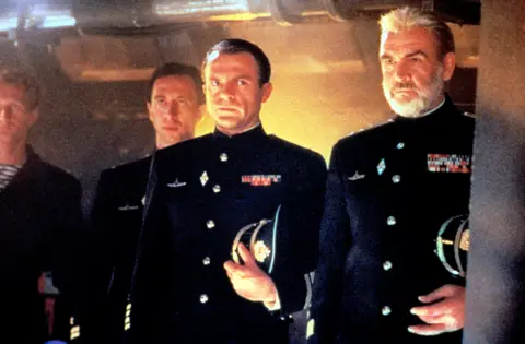 Everett/Shutterstock Neill alongside Sir Sean Connery in 1990 submarine thriller The Hunt For Red October