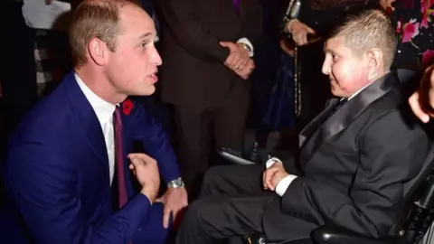 Getty Images TeenagerOf Courage award winner Moin Younis and Prince William