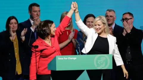 PA/Damien Storan Michelle O'Neill and Mary Lou McDonald on stage