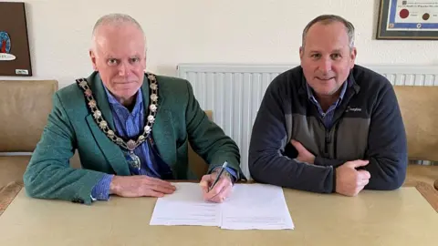 Somerset West And Taunton Council Councillors Mark Lithgow And Mike Rigby Signing The Lease