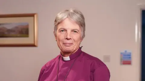 BBC The Archbishop of Wales Cherry van looks at the camera smiling