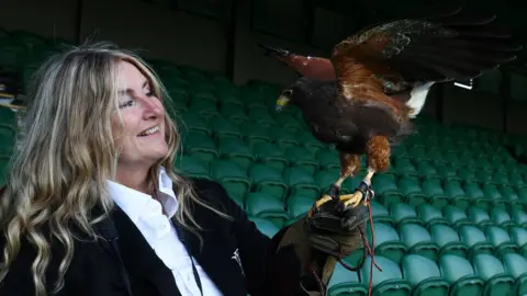 Reuters Donna Davis holding Rufus