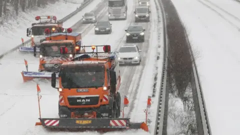 EPA Snow ploughs clear snow on the snow-covered Autobahn A1 highway near Wildeshausen, northern Germany