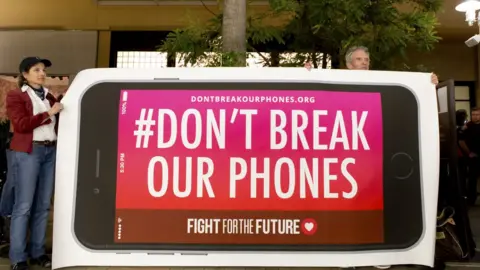 Getty Images Protesters in front of the Apple Store at the Fashion Valley Mall, 23 Feb 2016