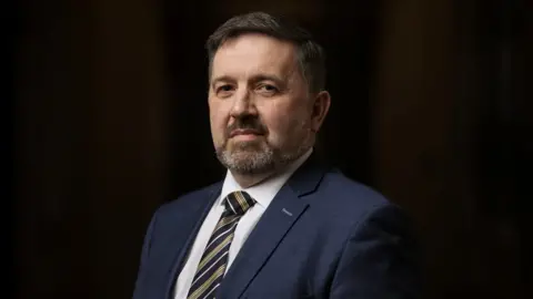 Liam McBurney/PA Media Robin Swann