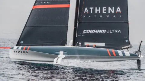 Athena Pathway Athena Pathway AC40 race boat on the water in Barcelona
