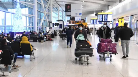 EPA Passengers at Heathrow Airport