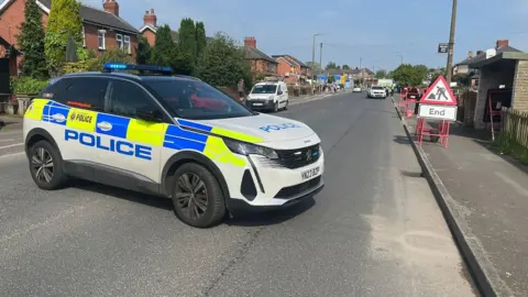 BBC/Oli Constable Police at the scene in Grimethorpe