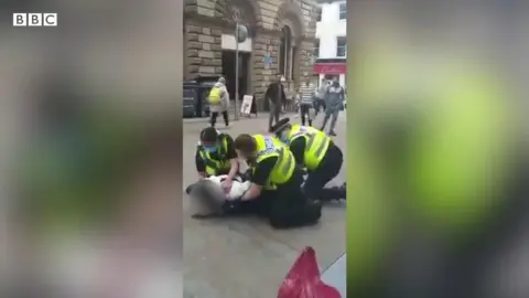 The man was arrested in Albion Street, Leeds, on Monday