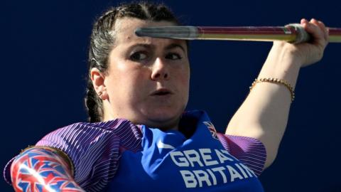 Hollie Arnold takes aim with the javelin