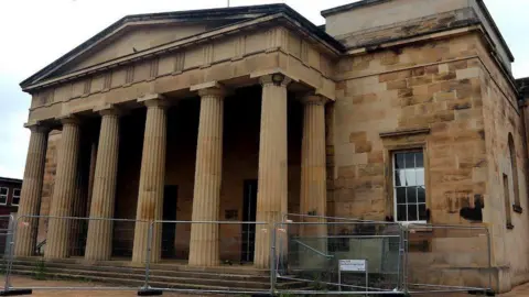 LDRS Hereford's Shirehall, a historic building with steps leading up to the entrance and columns at the front.