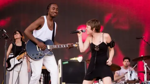 Getty Images Maggie Rogers and band