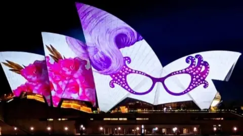 The Sydney Opera House with Dame Edna Everage hair and glasses on
