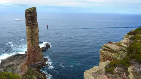 Dan Hunt Alexander Schulz on high wire